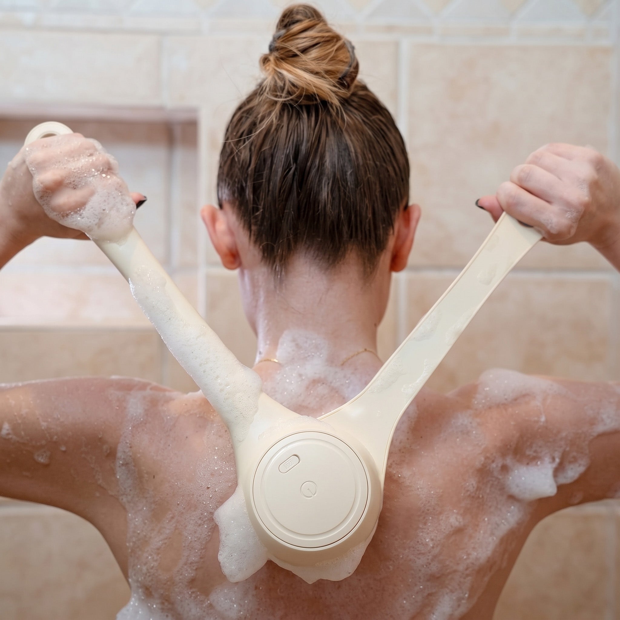 The ClearBack™ Electric Back Brush